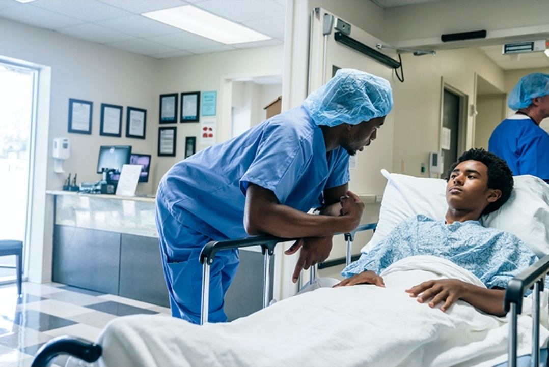 Healthcare professional attending to a patient in a hospital